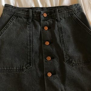 black denim button up skirt with pockets